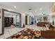 Spacious living room with modern flooring, bright paint, and an open floor plan to the living spaces at 5101 E Paradise Dr, Scottsdale, AZ 85254