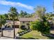 Attractive property showcasing a sprawling lawn and mature palm trees at 538 W Las Palmaritas Dr, Phoenix, AZ 85021