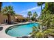Refreshing backyard pool surrounded by lush landscaping and palm trees creating a private oasis at 538 W Las Palmaritas Dr, Phoenix, AZ 85021
