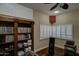 Bedroom featuring built-in bookshelves and soundproofing panels at 5431 E Piping Rock Rd, Scottsdale, AZ 85254