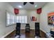 Bonus room with hardwood floors, sound-dampening panels, and modern speakers at 5431 E Piping Rock Rd, Scottsdale, AZ 85254