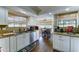 Bright kitchen featuring recessed lighting, windows with roman shades, stainless appliances, and tile backsplash at 5431 E Piping Rock Rd, Scottsdale, AZ 85254