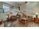 Open living area showcases a grand staircase, hardwood floors, and a high ceiling for a modern feel at 5431 E Piping Rock Rd, Scottsdale, AZ 85254