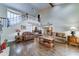 Spacious living room with staircase, hardwood flooring, and high ceilings, creating an inviting atmosphere at 5431 E Piping Rock Rd, Scottsdale, AZ 85254