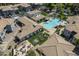 Aerial view of the community showing the swimming pool, green spaces, fire pit, and outdoor entertainment areas at 600 W Grove Pkwy # 2188, Tempe, AZ 85283