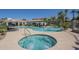 Sparkling community pool with hot tub, lounge chairs and lush landscaping at 600 W Grove Pkwy # 2188, Tempe, AZ 85283