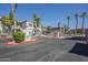 The community entrance features well-maintained landscaping, decorative tile work, and controlled gate access at 600 W Grove Pkwy # 2188, Tempe, AZ 85283