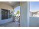 Quaint front porch features a gated entry and window showcasing a charming exterior view at 600 W Grove Pkwy # 2188, Tempe, AZ 85283