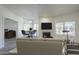 Inviting living room with a fireplace, modern decor, neutral colors and a view of the outdoors at 600 W Grove Pkwy # 2188, Tempe, AZ 85283