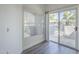 The patio features a sliding glass door and ample light with gray wood-look floors at 600 W Grove Pkwy # 2188, Tempe, AZ 85283