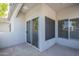 Enclosed back patio with windows and glass sliding doors at 600 W Grove Pkwy # 2188, Tempe, AZ 85283