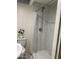 Shower with white marble surround and a rain shower head at 632 W Fordham Dr, Tempe, AZ 85283