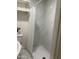 Shower with white marble surround and open shelving at 632 W Fordham Dr, Tempe, AZ 85283