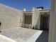 Enclosed brick-paved patio surrounded by stucco walls and featuring desert landscaping at 632 W Fordham Dr, Tempe, AZ 85283