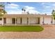 Wide backyard with gravel, artificial turf and a covered patio space at 8411 E Via De Jardin --, Scottsdale, AZ 85258
