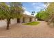 Backyard featuring a covered patio and drought landscaping at 8411 E Via De Jardin --, Scottsdale, AZ 85258