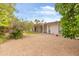 Spacious backyard featuring low-maintenance gravel and a patch of green turf at 8411 E Via De Jardin --, Scottsdale, AZ 85258