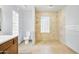 Bathroom featuring a walk-in shower with beige tile, a toilet, and a vanity at 8411 E Via De Jardin --, Scottsdale, AZ 85258