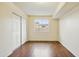 Bedroom features laminate floors, window and closet with doors at 8411 E Via De Jardin --, Scottsdale, AZ 85258
