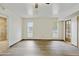 A bedroom with a ceiling fan and two windows offers natural light at 8411 E Via De Jardin --, Scottsdale, AZ 85258