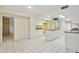 Tiled kitchen features ample cabinetry, an island cooktop, and lots of space at 8411 E Via De Jardin --, Scottsdale, AZ 85258