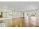 Spacious living room featuring wood floors and an open floor plan at 8411 E Via De Jardin --, Scottsdale, AZ 85258