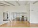 Open living room features hardwood floors and decorative fireplace at 8411 E Via De Jardin --, Scottsdale, AZ 85258