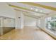 Spacious living room featuring beamed ceilings and large windows at 8411 E Via De Jardin --, Scottsdale, AZ 85258