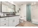 Bathroom featuring white cabinets, dark countertops, tile floors, and a shower-tub combo at 955 E Knox Rd # 126, Chandler, AZ 85225
