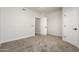 Bedroom features neutral carpet, white walls, and white doors at 955 E Knox Rd # 126, Chandler, AZ 85225
