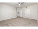 Spacious bedroom features neutral carpet, white walls, and doorways to the bathroom and hallway at 955 E Knox Rd # 126, Chandler, AZ 85225