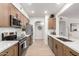 Well-equipped kitchen featuring stainless steel appliances, and plenty of cabinet space at 955 E Knox Rd # 126, Chandler, AZ 85225
