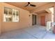 Spacious covered patio with ceiling fan, window, and sliding door at 955 E Knox Rd # 126, Chandler, AZ 85225