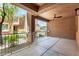 Covered patio space with ceiling fan and a view of the landscaped surroundings at 955 E Knox Rd # 126, Chandler, AZ 85225