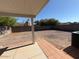 A backyard featuring privacy fence and gravel at 990 E Desert Rose Trl, San Tan Valley, AZ 85143