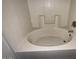 A close up of an oval bathtub at 990 E Desert Rose Trl, San Tan Valley, AZ 85143