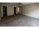Spacious bedroom with multiple closets and en-suite bathroom at 990 E Desert Rose Trl, San Tan Valley, AZ 85143