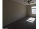 Bedroom featuring neutral walls, carpet flooring, a ceiling fan, and natural lighting at 990 E Desert Rose Trl, San Tan Valley, AZ 85143
