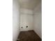 Walk-in closet with carpet flooring, wire shelving, and potential for organization at 990 E Desert Rose Trl, San Tan Valley, AZ 85143