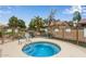 Community hot tub with a waterfall feature in a well-maintained setting at 1405 E Chicago Cir, Chandler, AZ 85225
