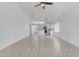 Bright living room featuring tile floors and view of the modern kitchen at 1405 E Chicago Cir, Chandler, AZ 85225