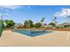 Get active at the community tennis courts surrounded by lush greenery, offering a great space for recreation at 1405 E Chicago Cir, Chandler, AZ 85225
