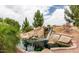 Scenic view of the community water feature with rock landscaping and a tranquil waterfall providing a peaceful view at 1405 E Chicago Cir, Chandler, AZ 85225