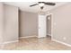 Neutral bedroom featuring a ceiling fan and tiled floors at 1430 N Ashland --, Mesa, AZ 85203