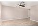 Inviting living room with tiled floors, neutral walls, and a ceiling fan, perfect for relaxing at 1430 N Ashland --, Mesa, AZ 85203