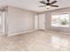 Spacious living room featuring tiled floors and natural lighting at 1430 N Ashland --, Mesa, AZ 85203