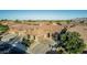 Inviting single-story home with desert landscaping, a spacious driveway, and well-maintained surroundings at 16077 W Anasazi St, Goodyear, AZ 85338
