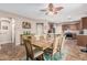 Cozy dining area seamlessly connects to a well-equipped kitchen, perfect for entertaining guests at 16077 W Anasazi St, Goodyear, AZ 85338