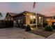 Charming single-story home featuring desert landscaping, gated RV parking, and a long driveway at 16077 W Anasazi St, Goodyear, AZ 85338