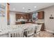 Spacious kitchen features granite countertops, stainless steel appliances, and ample cabinet space at 16077 W Anasazi St, Goodyear, AZ 85338